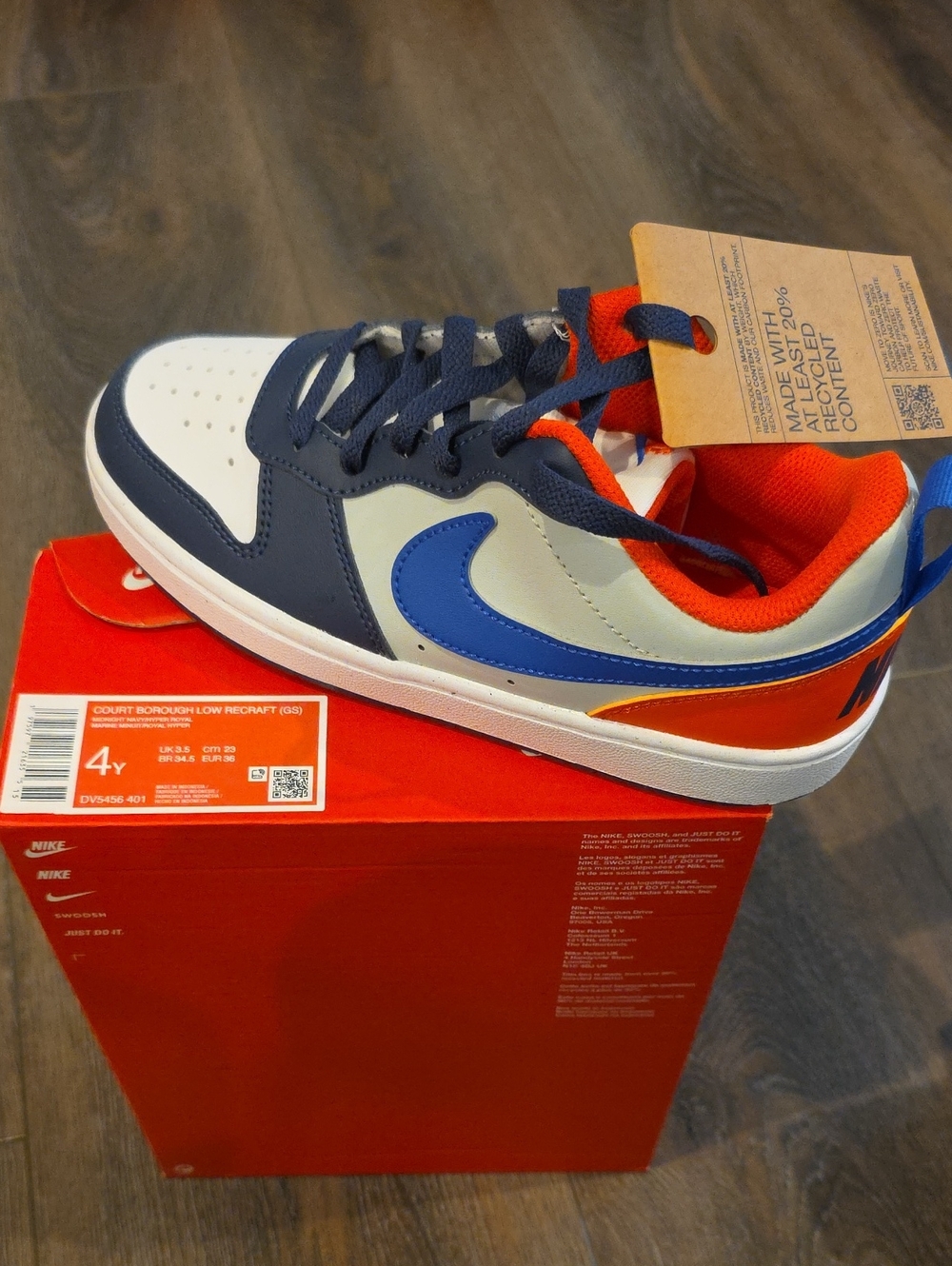 Nike Kids White, Navy & Bright Orange Low-Top Sneaker with Blue Swoosh Sz 4y